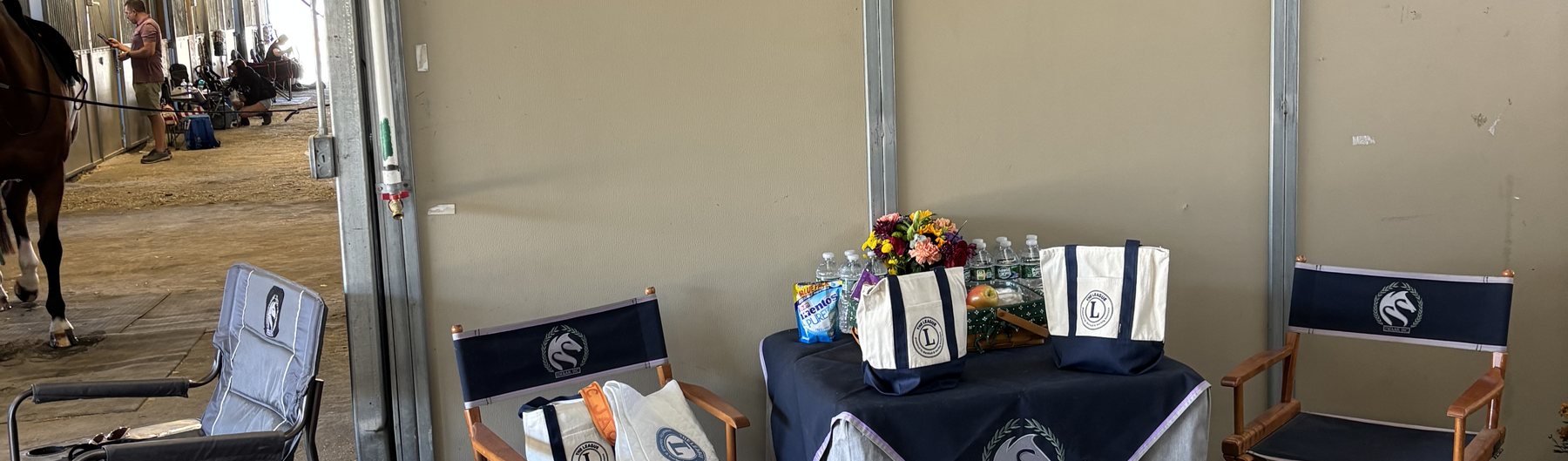 Inside the barn, with the season's championship ribbons on display