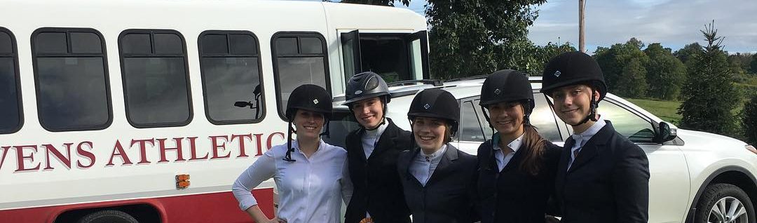 An intercollegiate equestrian team at a horse show